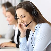 Lady with a headset answering a phone call