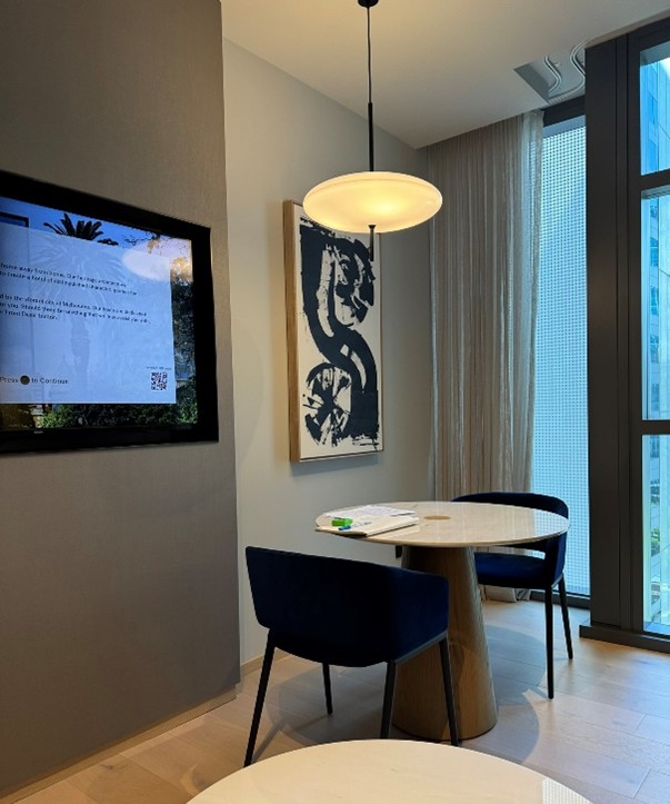 small round table and 2 chairs in the one-bedroom apartment